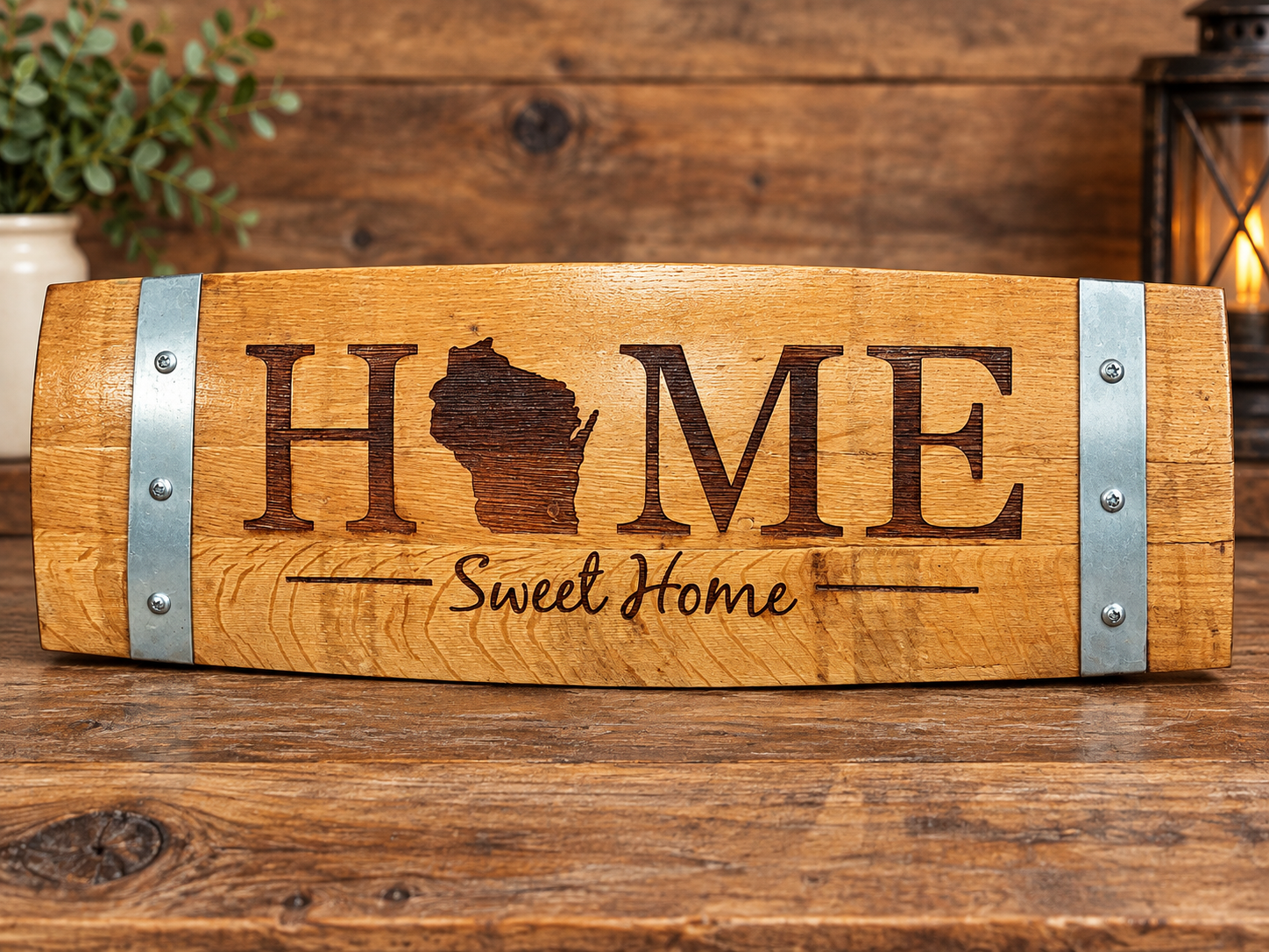 Whiskey barrel stave sign engraved with a Wisconsin Home Sweet Home design