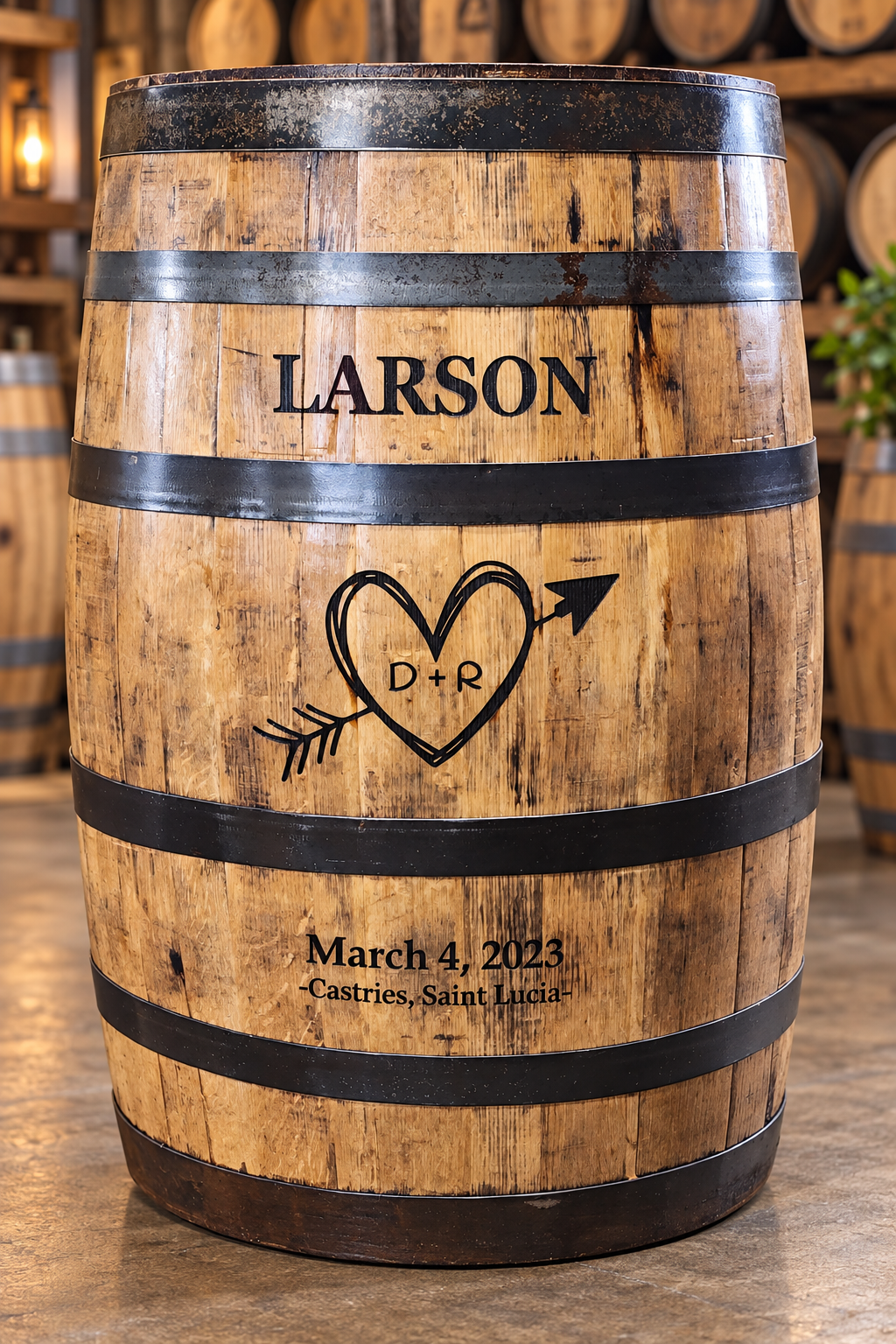 Personalized whiskey barrel engraved with the Larson name, heart artwork, wedding date, and location