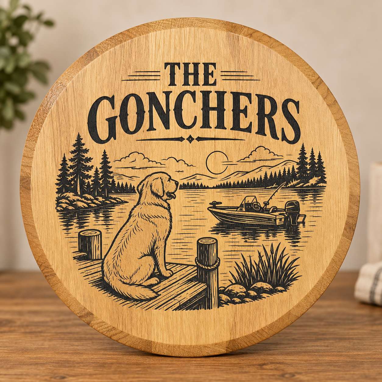 Custom engraved round wood sign with family name and detailed lakeside scene