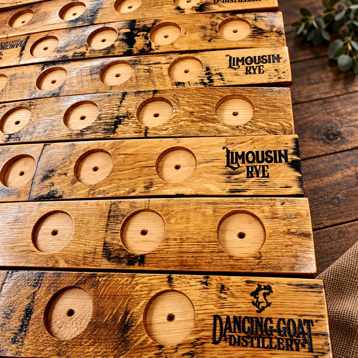 Limousin Rye and Dancing Goat branded barrel stave tasting boards