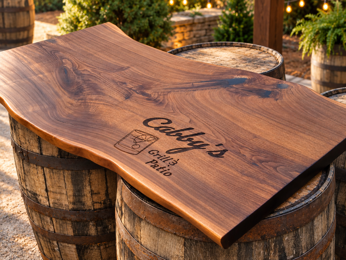 Custom live edge wood tabletop engraved for Colby's Grill and Patio
