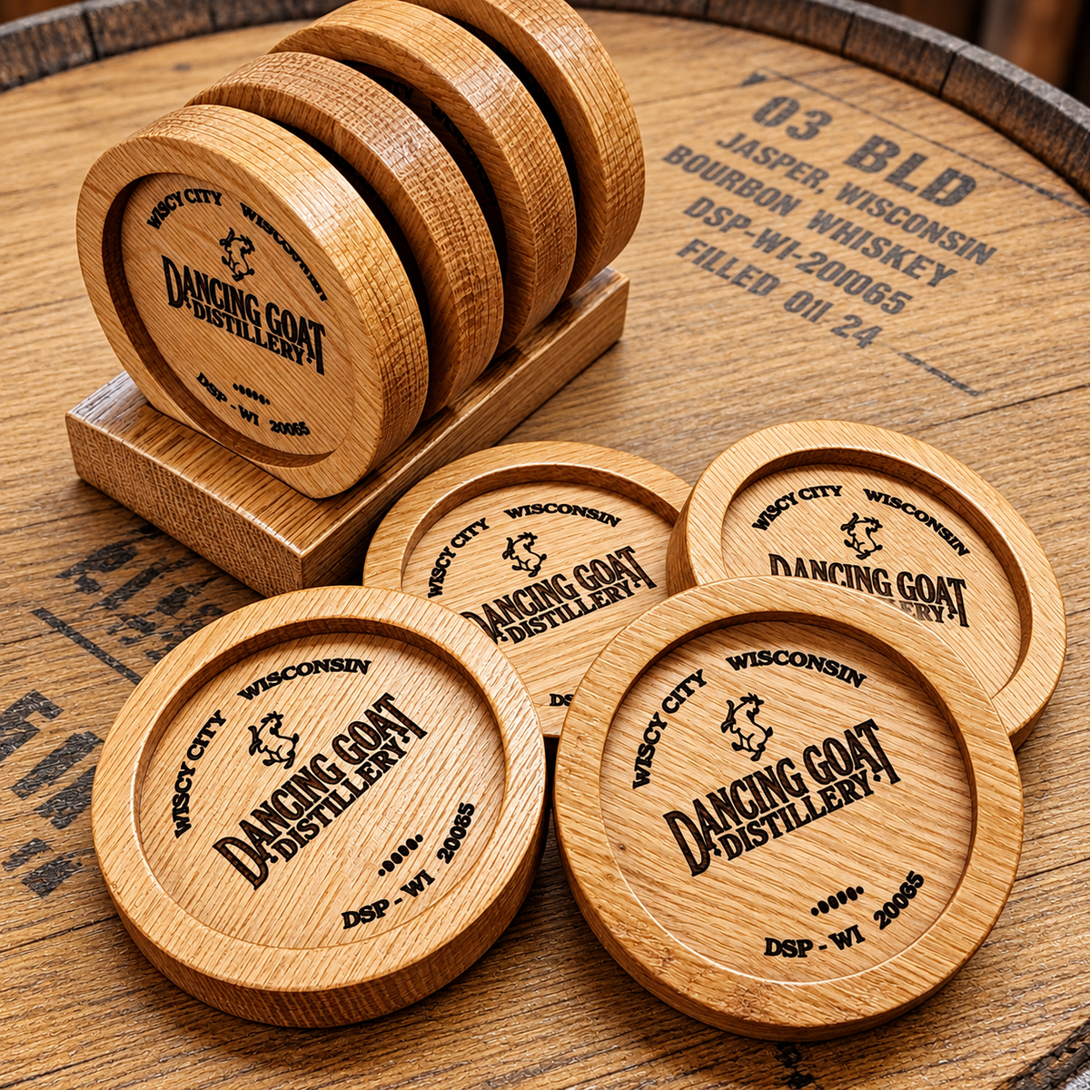Dancing Goat Distillery wood coasters and holder on a whiskey barrel head